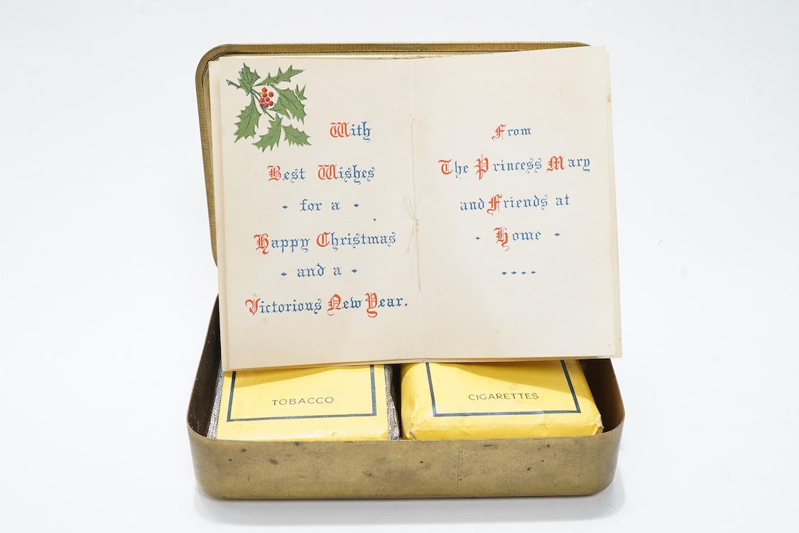 A 1914 Princess Mary Christmas tin containing the original sealed packet of tobacco, the packet of cigarettes and the Christmas card